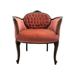 Edwardian inlaid rosewood parlour suite, comprising pair of tub shaped armchairs (W77cm, D69cm, H88cm); and matching two-seat sofa (W112cm, D69cm, H88cm), each with carved crest rails with shell motifs, deep button-tufted oval backs upholstered in pink fabric with braid trim, on cabriole supports