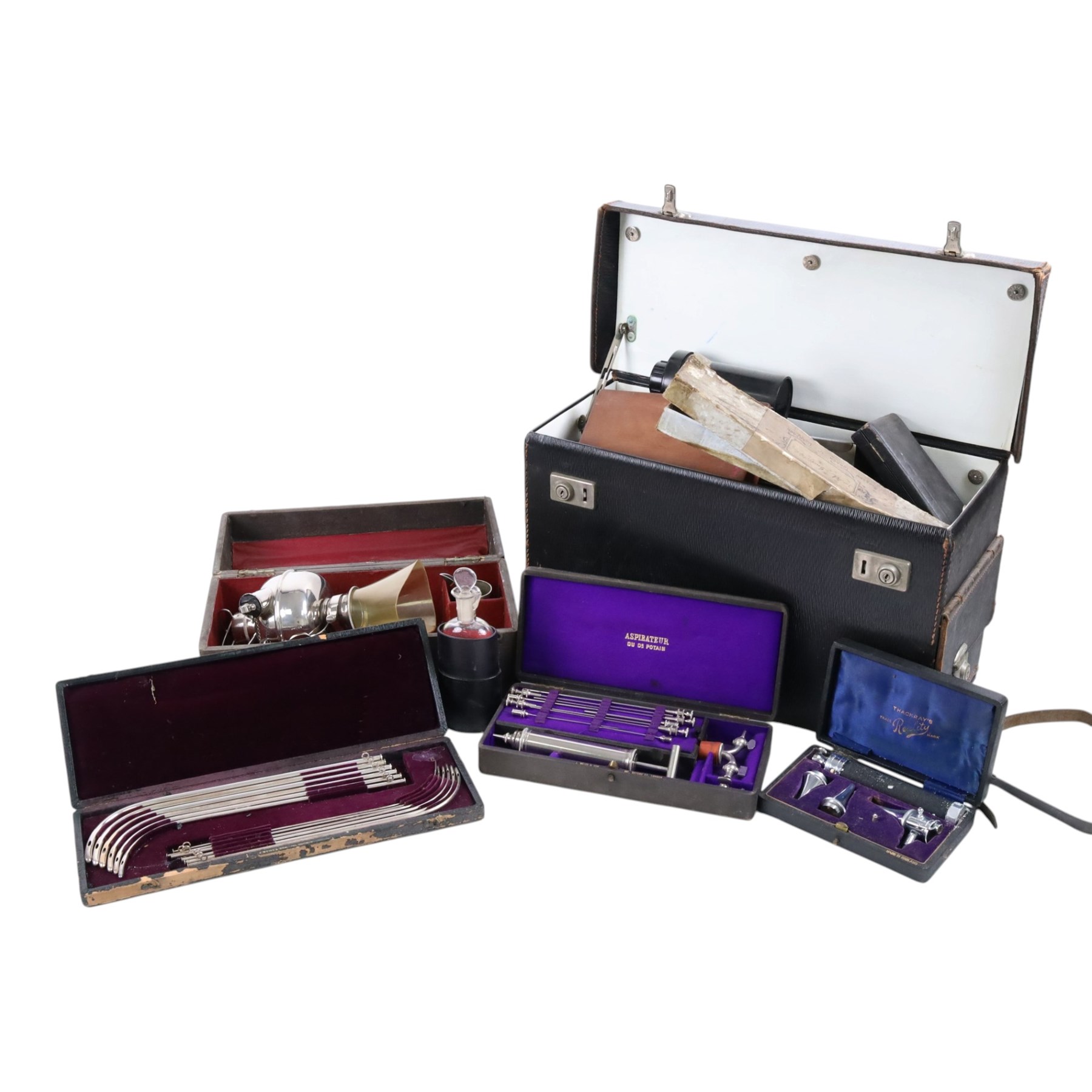 Collection of early 20th century and later medical equipment, including portable inhaler, tonsil guillotine, aspirator, steel catheter set, etc, in leather boxes
