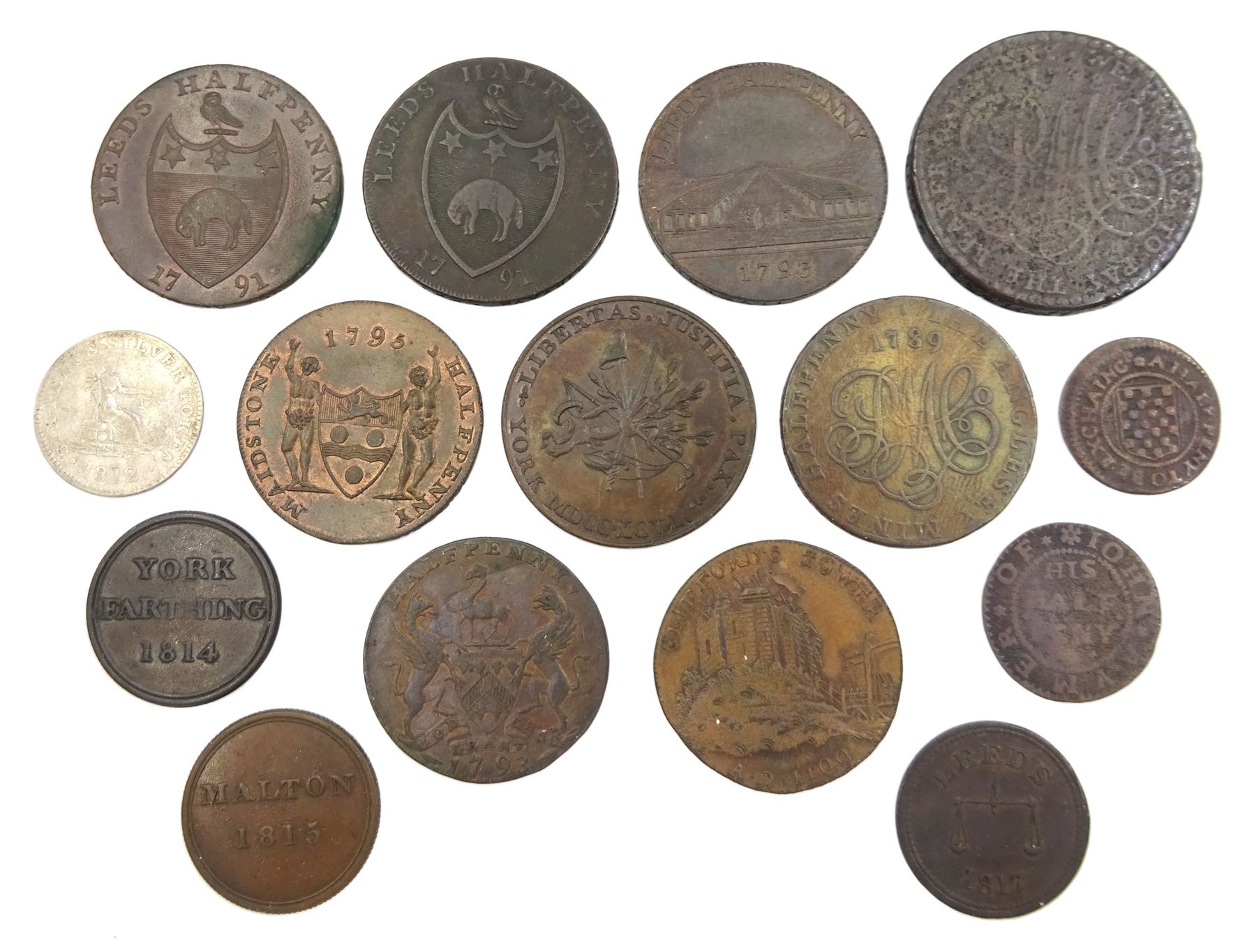 Fifteen 18th and 19th century tokens including 1791 Leeds halfpenny,  1796 York halfpenny, 1812 Doncaster Mirfin & Parker six-pence silver token, 1814 York farthing,  etc

