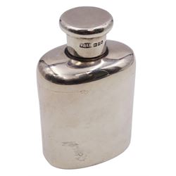 Early 20th century silver hip flask, of plain oval form with rounded shoulders and screw threaded cover, hallmarked Finnigans Ltd, London 1914, H9cm, 2.85 ozt (88.8 grams)