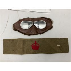 WW1 British Army Derby Scheme 1915 Attested armband; beret with East Yorkshire cap badge; pair of fur lined leather flying/motorcycle goggles; HMS Pembroke cap band; and small quantity of RNAS cloth and metal badges etc