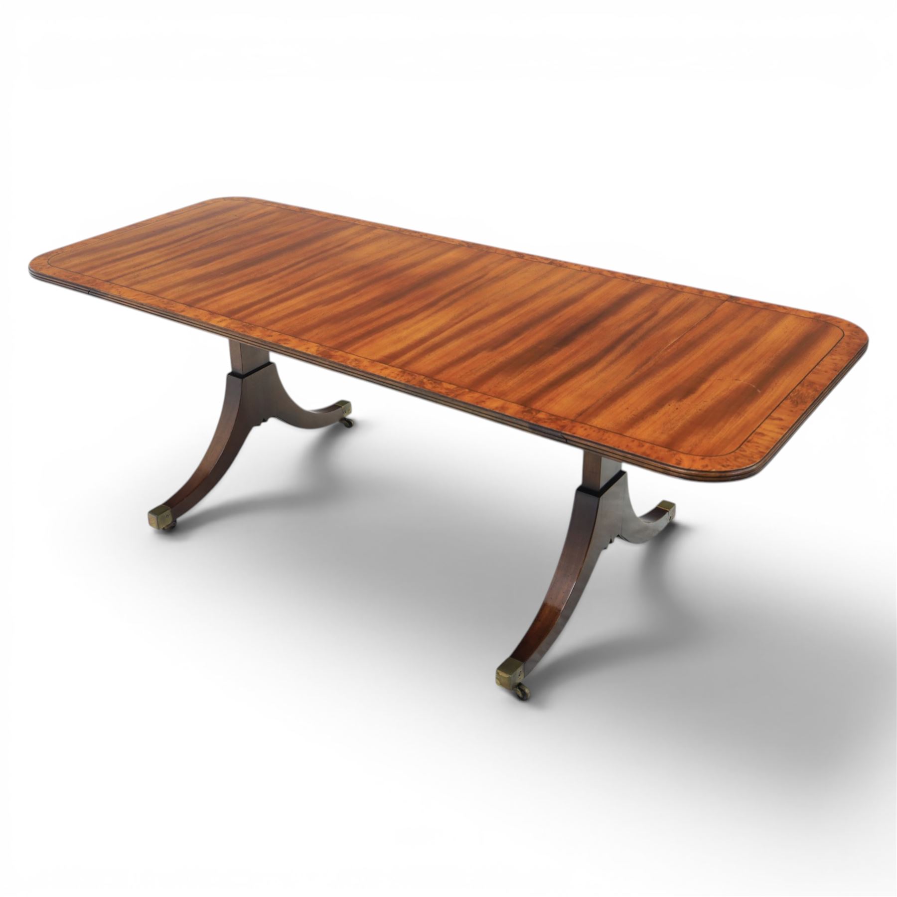 Regency design mahogany drop leaf coffee table, rectangular top crossbanded in walnut, twin pillar legs