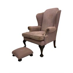 Georgian style wingback armchair, upholstered in fabric light purple fabric, on ball and claw carved front supports, with matching footdtool