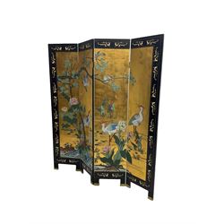 Chinese four panel folding screen, black lacquered with painted decoration