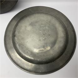 Group of seven 19th century pewter chargers, each of circular form with dished centre, two examples with touch marks verso, each approximately D39cm