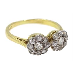 Early-mid 20th century diamond ring consisting of two diamond flower head clusters, stamped 18ct & Plat
