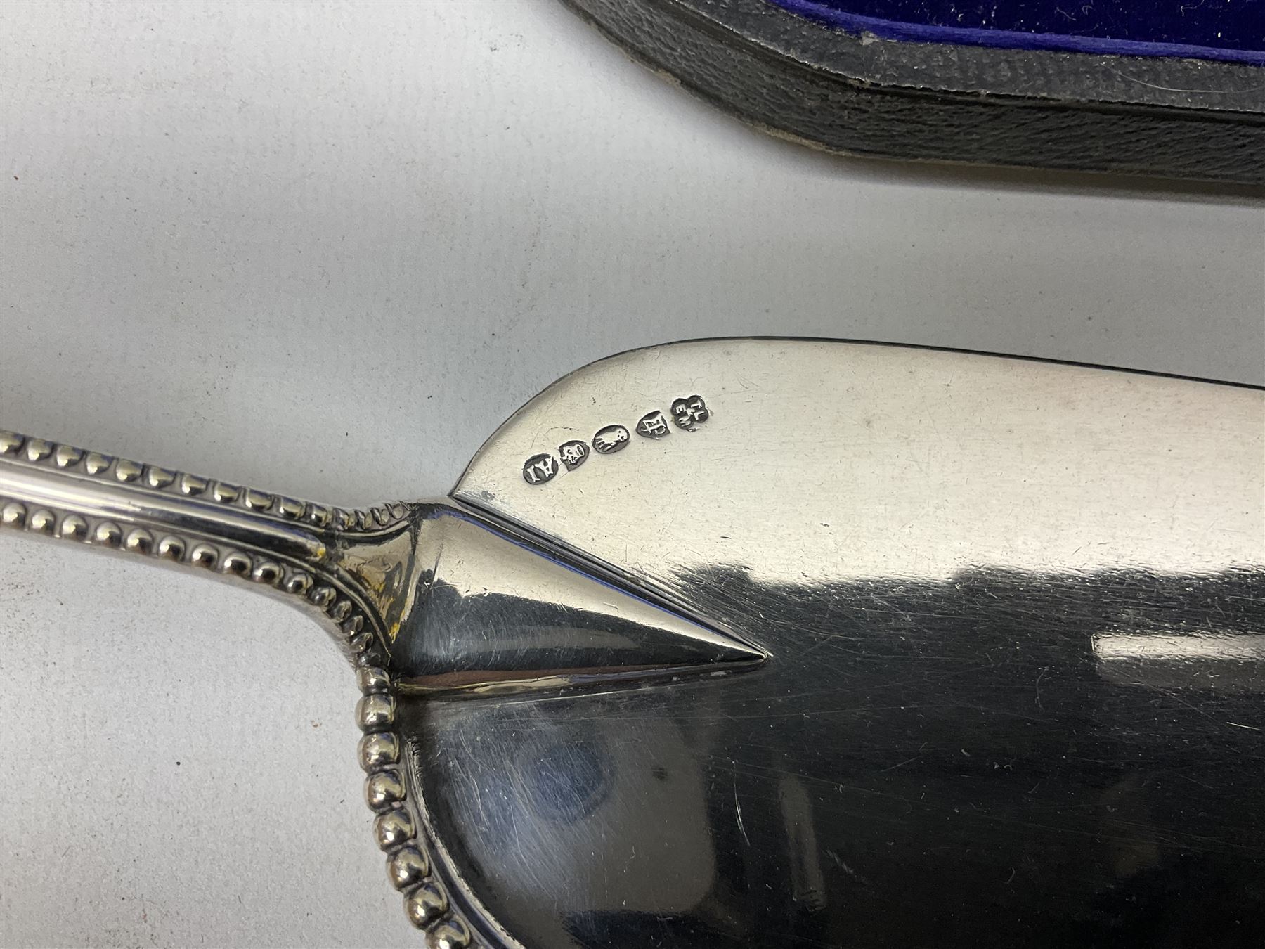 Cased pair of Wedgwood silver-plate book stands, silver-plate baby feeding spoon and pusher in box, other silver-plated cutlery