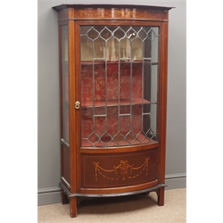  Edwardian mahogany inlaid display cabinet, lead glazed bow front, on four supports, W78cm, H142cm, D45cm  