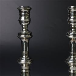 Pair of silver candlesticks, with knopped stems and upon spreading circular weighted bases, hallmarked William Comyns & Sons Ltd, London 1979, H20cm