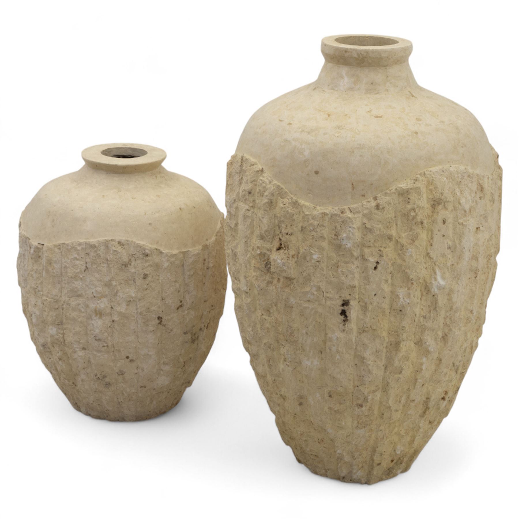 Two Mactan composite stone vases, of rounded tapering form with textured lower bodies and smooth necks

(Smaller vase H 64cm, W 45cm)