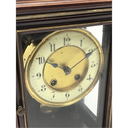 Late 19th century walnut cased mantle clock enclosed by bevelled glazed door and side panels, twin train driven movement striking the hours and half on coil, H30cm (with pendulum)