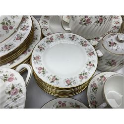 Minton Spring Bouquet pattern dinner and tea service, comprising dinner plates, twin handled tureens with covers, meat platter, teapot, milk jug, sugar bowl with cover, tea cups and saucers, bowls, cake plate, side plates, dessert plates, etc all with printed mark beneath (82)