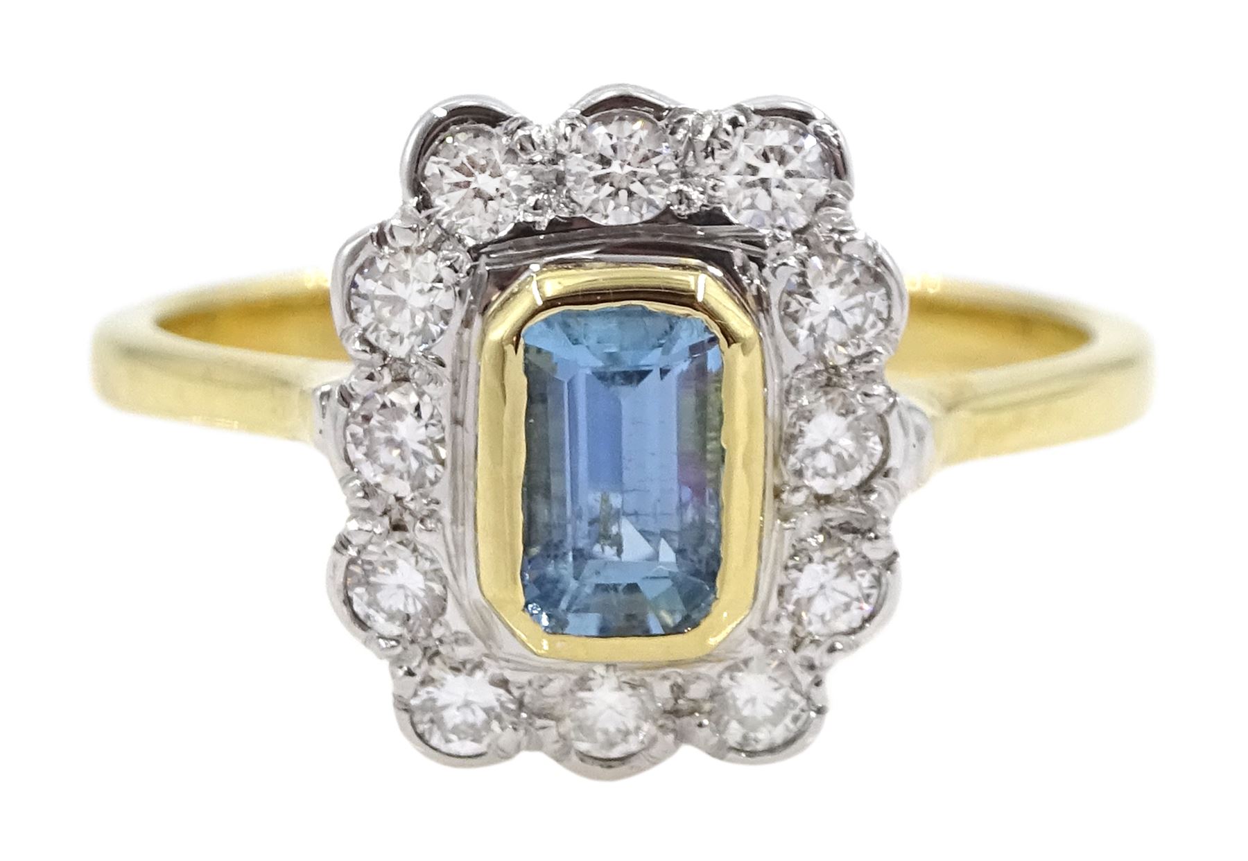 18ct gold emerald cut aquamarine and round brilliant cut diamond cluster ring, hallmarked, aquamarine approx 0..60 carat, total diamond weight approx 0.30 carat