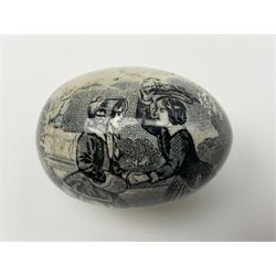 Victorian pottery egg transfer, printed with scenes 'Androcles and the lion' and a courting couple, L7cm 