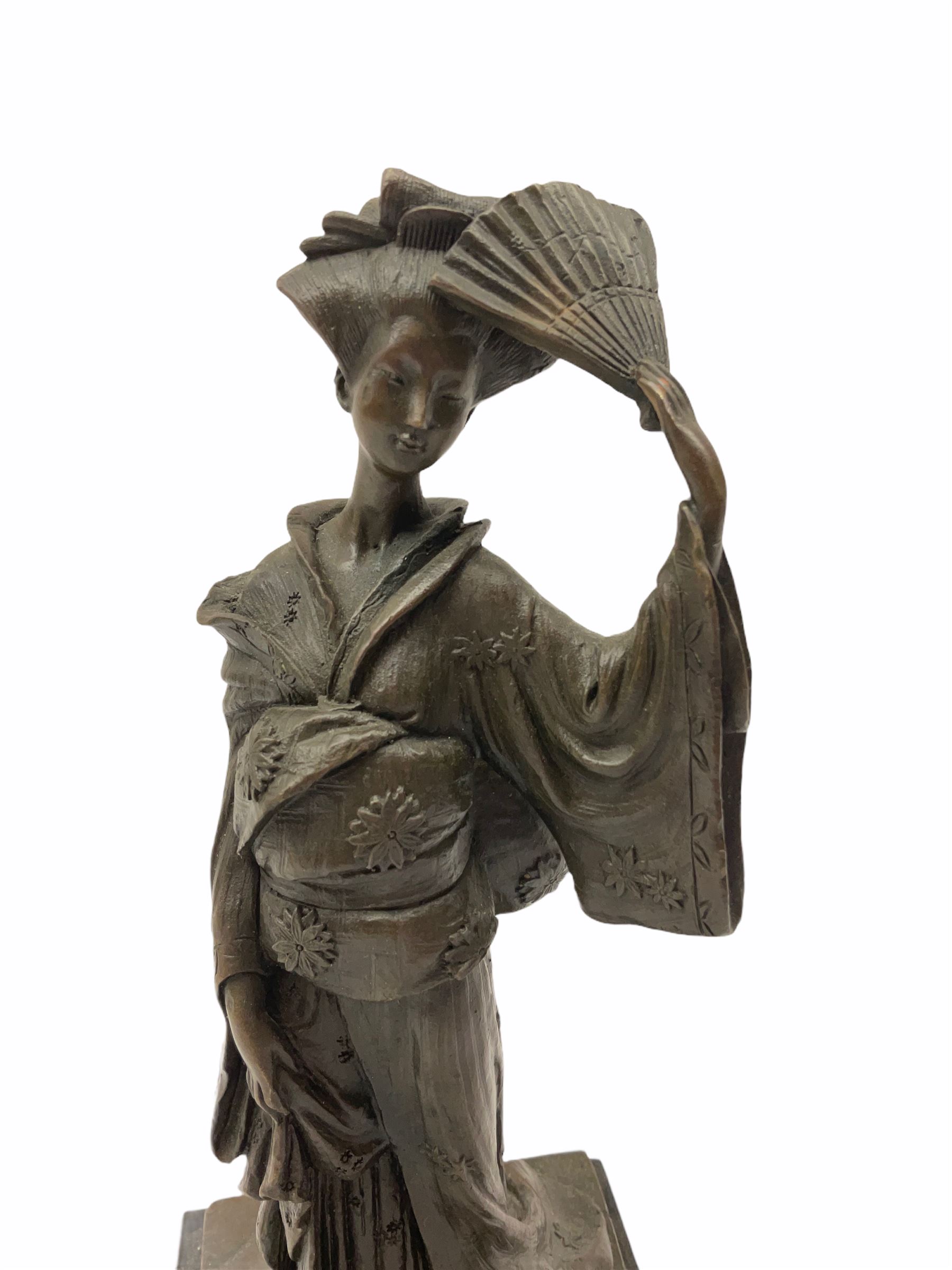 A Japanese bronze modelled of a Geisha, impressed Kamiko, upon slate base, H25cm. 