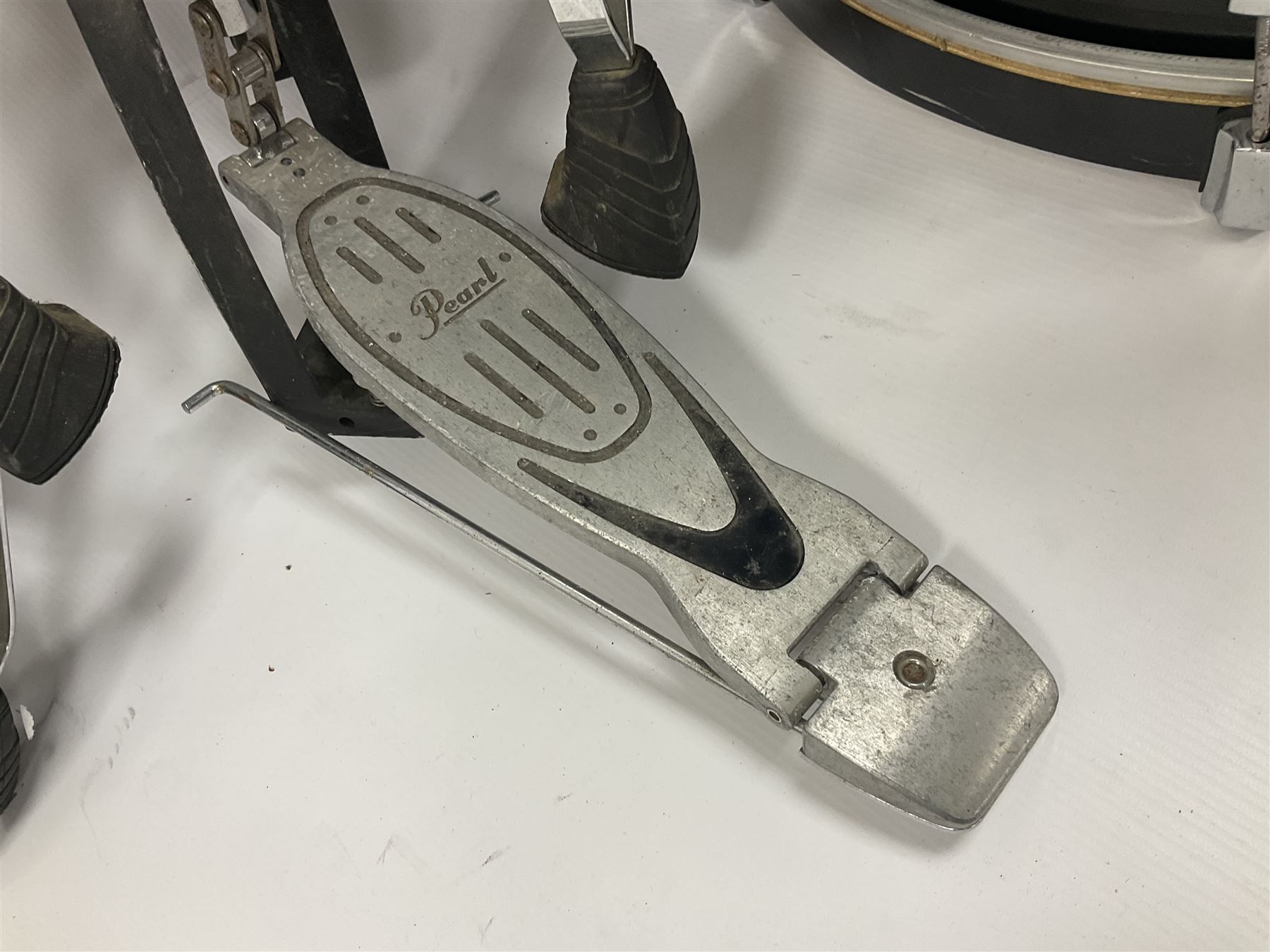 Pearl Vision SST Birch Ply shell four-piece drum kit in black comprising bass drum with foot pedal and three graduated toms; together with Pearl Custom Alloy Sensitone steel snare drum, drum and cymbal stands, microphone stand, stool and various drum sticks 