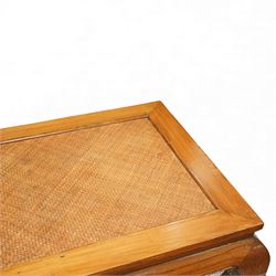 Chinese hardwood low coffee table, rectangular framed top inset with woven cane panel, mitred moulded edge, plain apron, raised on shaped and out-scrolled end supports joined by stretchers