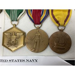 Nine American medals comprising Legion of Merit, Distinguished Flying Cross, Purple Heart named to Dick L. Sparman, Navy Good Conduct Medal, National Defence Service Medal, Army Commendation Medal, two WWII Victory Medals and China Medal; all with ribbons (9)