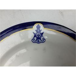 Collection of Regimental dinner wares, Comprising Royal Sussex; two dinner plates, two side plates and a soup bowl, Royal Leicestershire; two dinner plates, East Yorkshire Regiment side plate and Gordon Highlanders side plate, all decorated with the regiment's crests and blue and gilt boarders (9)