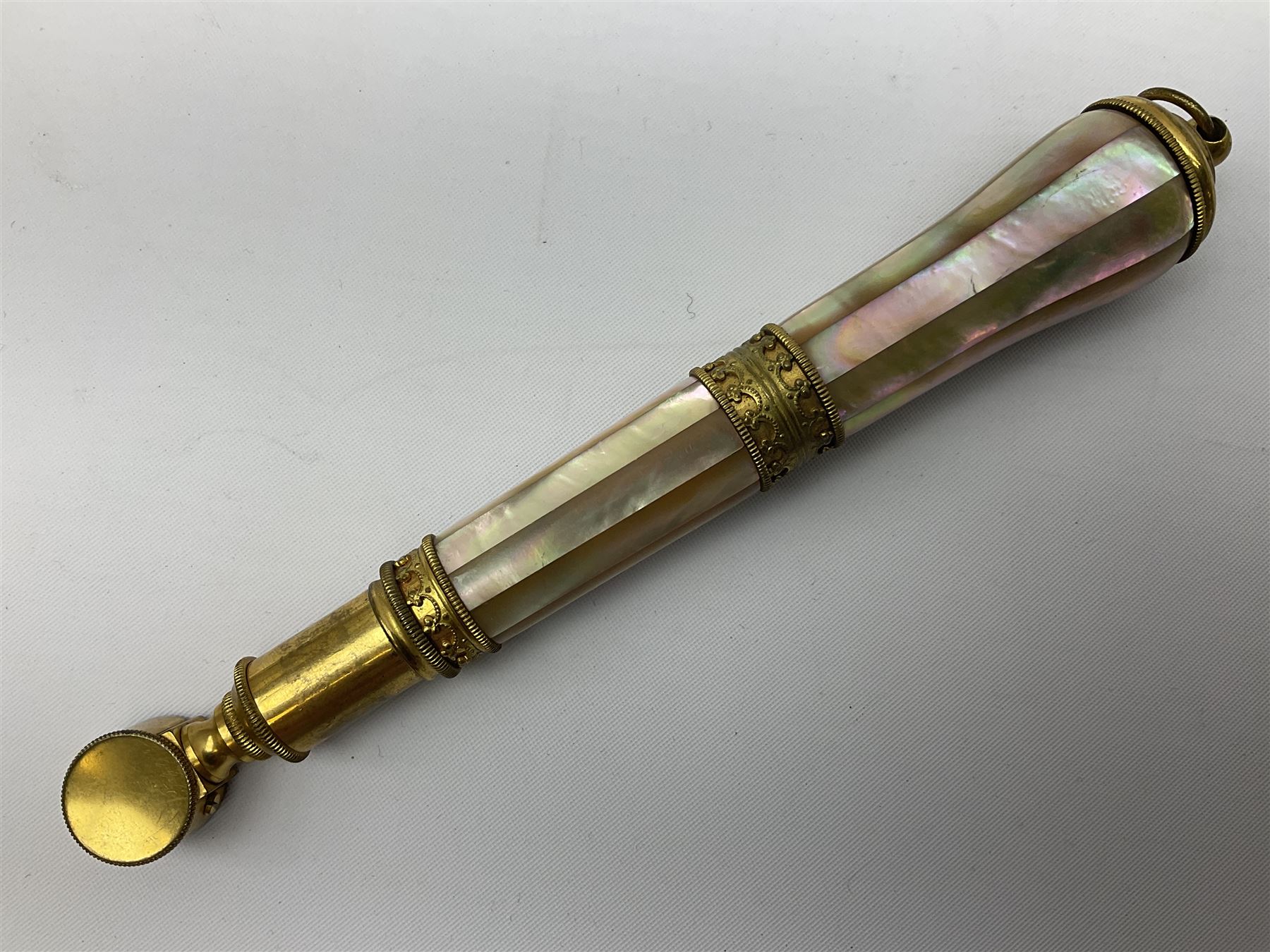 Pair of Victorian mother of pearl and gilt brass opera glasses, with