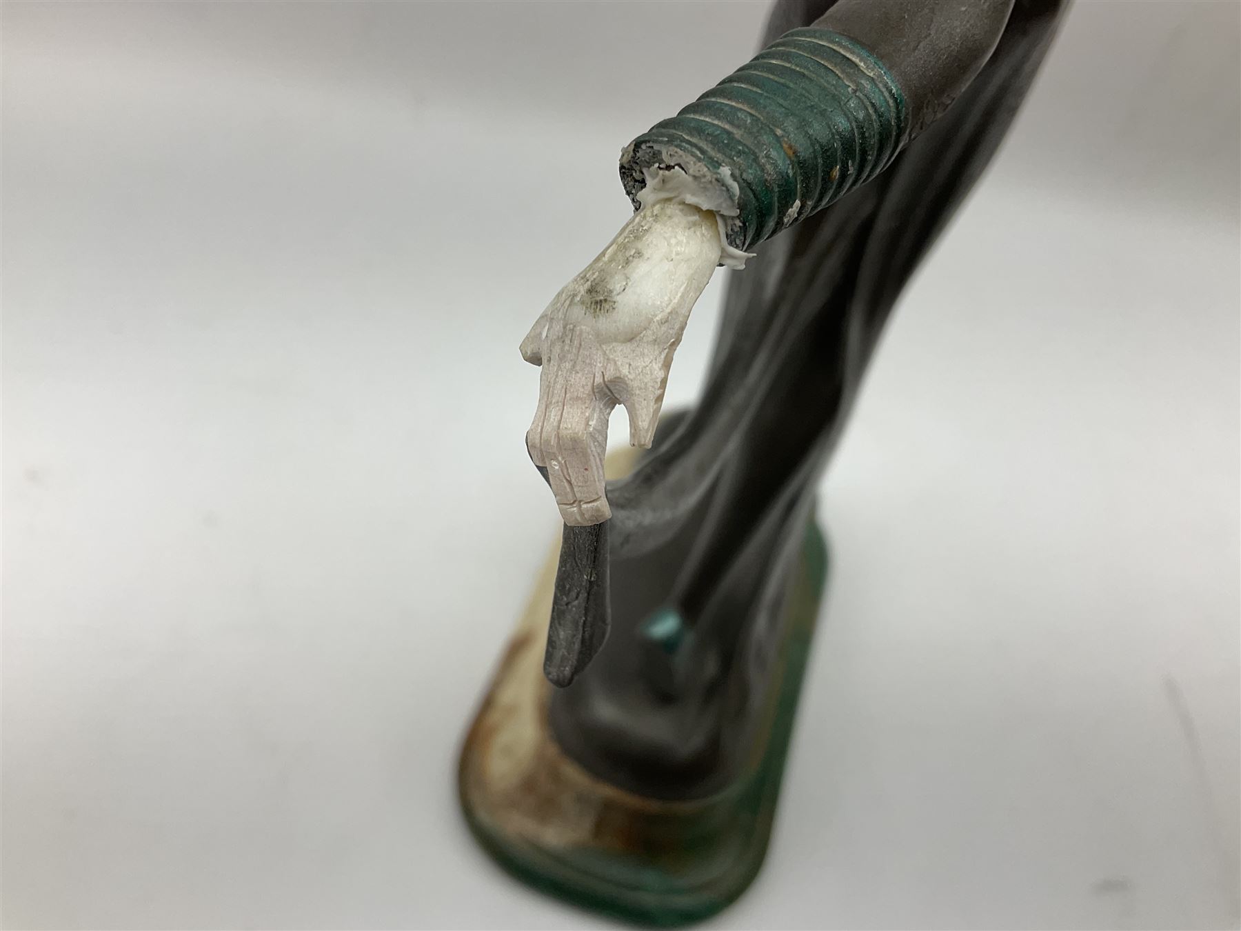 Art Deco style bronze, after Josef Lorenzl, modelled as a dancing lady with outstretched arms, with resin head and hands, raised upon marble effect base, signed to base, H38cm