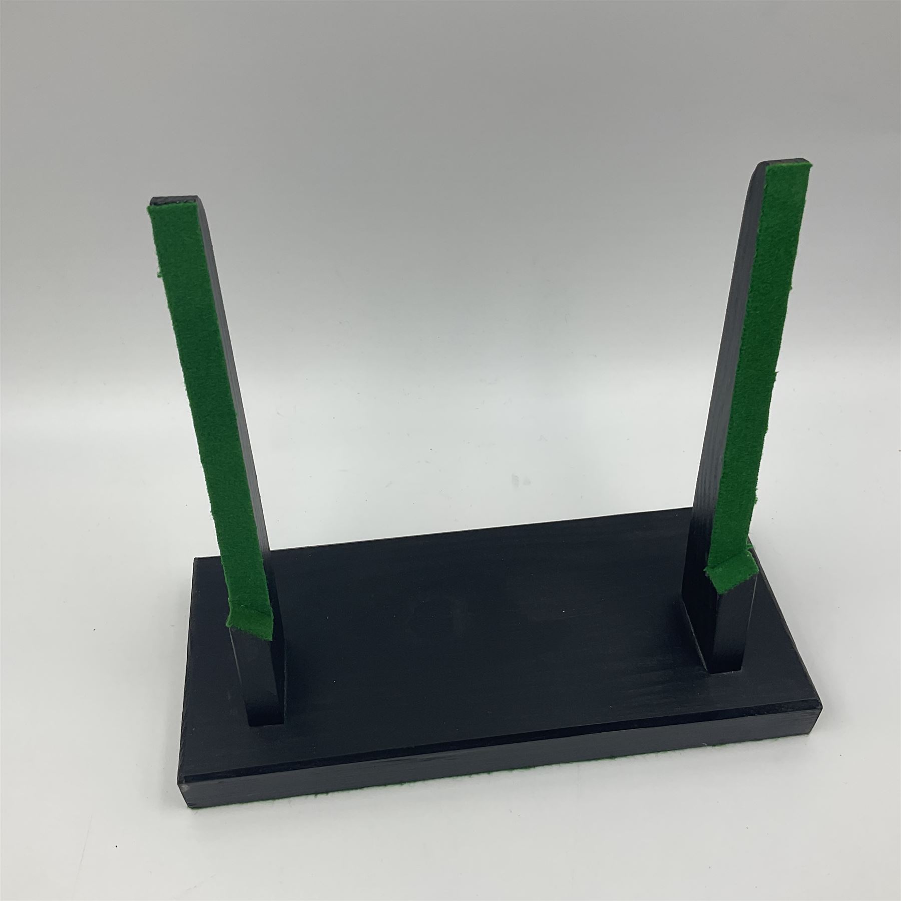 Polished ammonite plate, formed of individual ammonites age; Jurassic period, upon an ebonised stand, D27cm