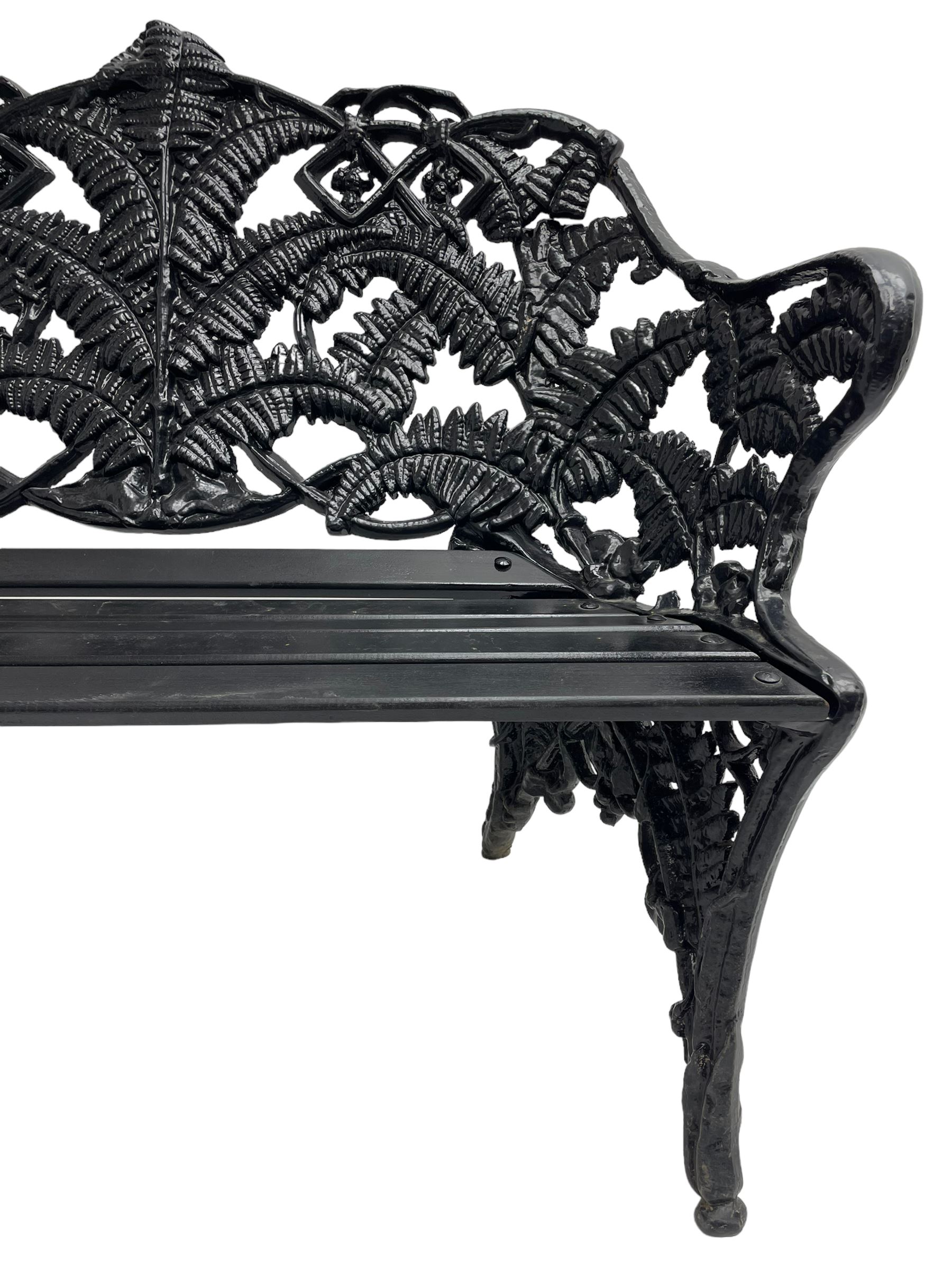 Coalbrookdale - black painted cast iron 'fern' pattern garden bench, decorated with trailing fern leaves, mahogany slatted seat