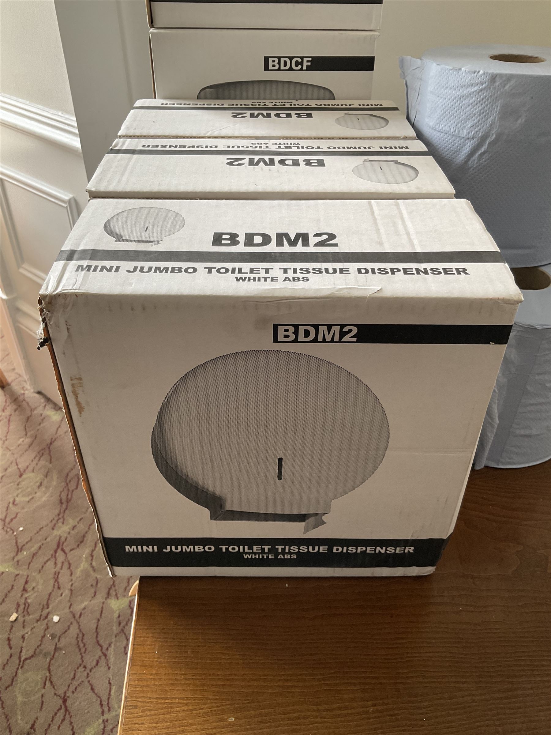 Pair of centrefeed towel dispensers and three mini jumbo toilet tissue dispensers with three blue paper rolls- LOT SUBJECT TO VAT ON THE HAMMER PRICE - To be collected by appointment from The Ambassador Hotel, 36-38 Esplanade, Scarborough YO11 2AY. ALL GOODS MUST BE REMOVED BY WEDNESDAY 15TH JUNE.