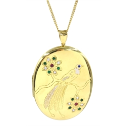  Heavy 18ct gold ruby, emerald and sapphire locket with engraved bird of paradise, perched on a branch hallmarked, on 18ct gold chain stamped 750  