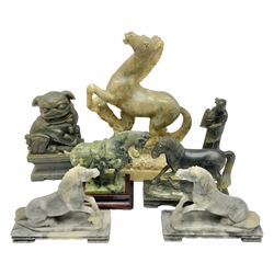 Oriental hardstone carvings, including Foo dog on plinth, rearing horse, Tang horse on wooden plinth etc 