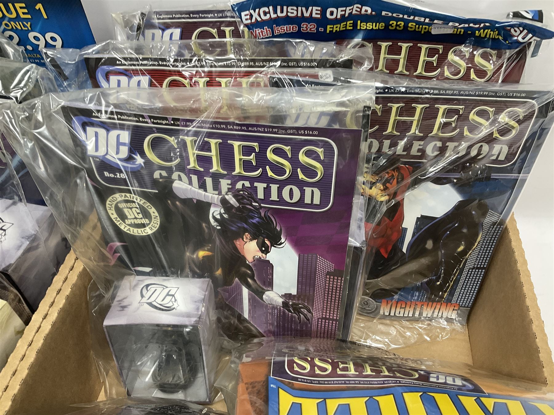 Eaglemoss DC Chess Collection - thirty=-two magazines with models each as issued in unopened plastic bags (32)