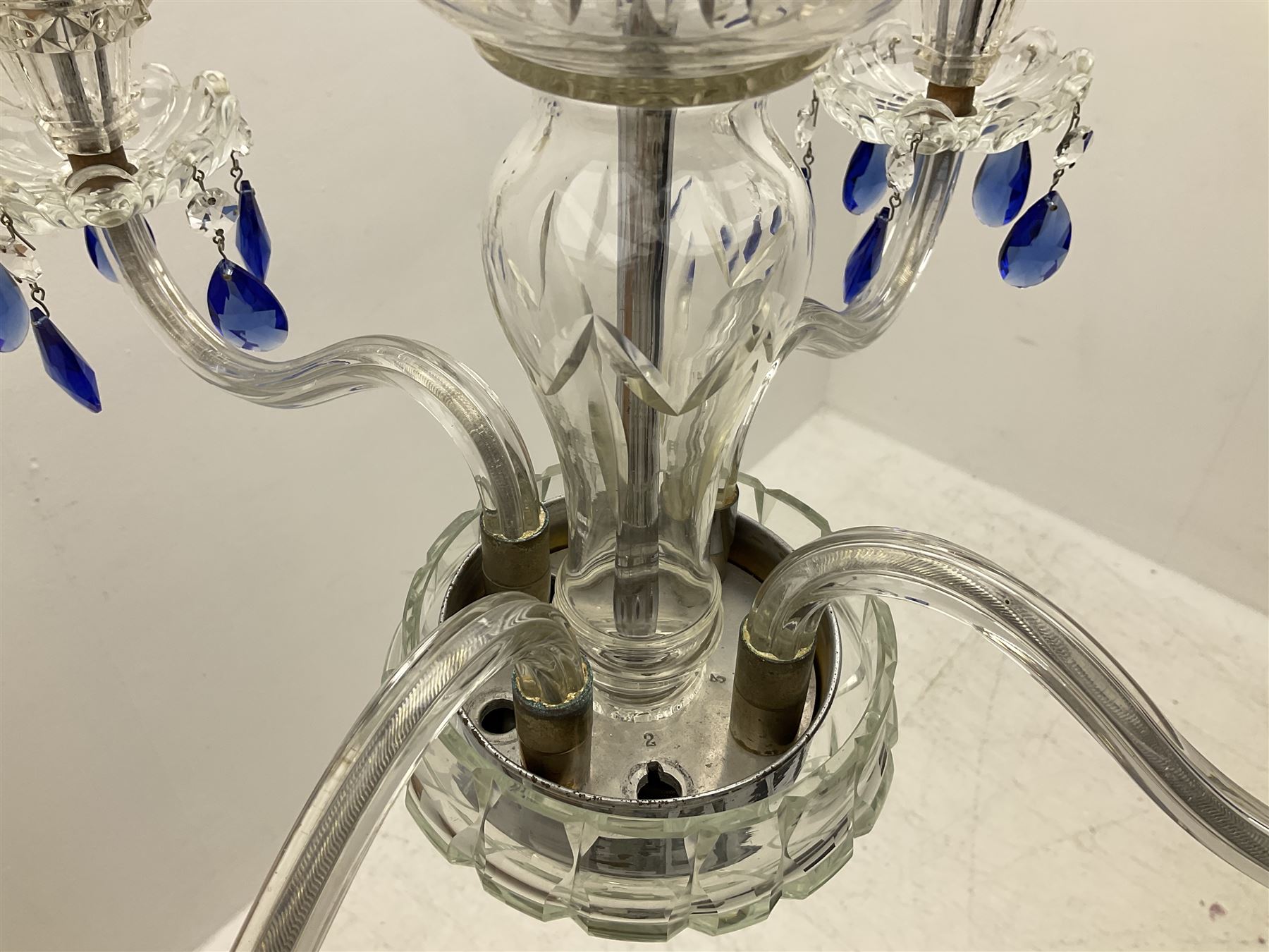 Glass four light chandelier, the baluster shaped central glass column supporting four curved branches with drip pans and blue glass drops, approx height excl fitting H50cm