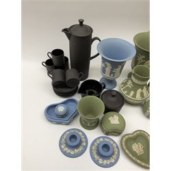 Collection of Wedgewood light blue and sage green Jasperware, to include blue bowl, D20cm, green footed bowl, D20cm, two large vases, trinket boxes, jugs, plates, etc., (29), together with a Wedgewood Black basalt coffee set, comprising coffee pot, milk jug, lidded sugar bowl and six coffee cans and saucers. 