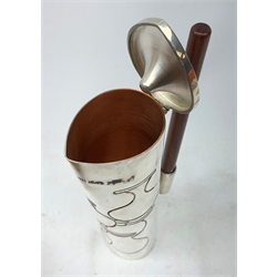 A silver plated Ravissant water jug, of cylindrical form with wooden open handle, detailed with a group of vases, marked beneath Ravissant, H25.5cm.  