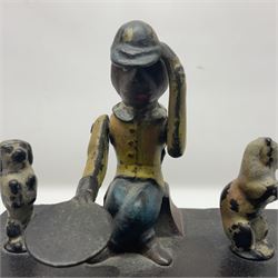 American 'Organ Bank' musical cast-iron mechanical money bank with hand cranked action and seated figure with two dancing dogs on top; locking door to base (no key); marked to the back 'Pat June 13 1882', H19cm