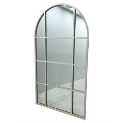 Contemporary arched overmantel mirror, segmented into twelve sections set within a white p...