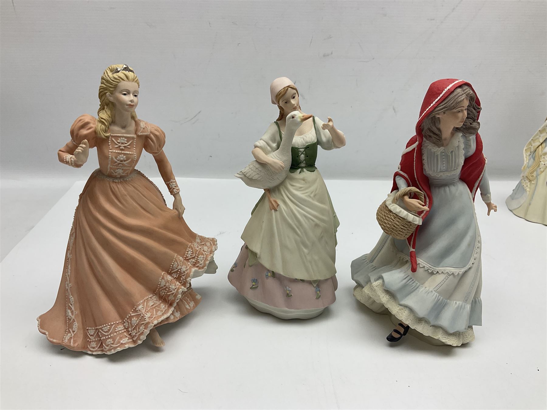Collection of six Wedgwood Danbury Mint fairy tale figures, comprising Cinderella, Red Riding Hood, Little Bo Peep, Mary had a Little Lamb, Goose Girl and Rapunzel