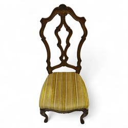 20th-century set of four French provincial-style stained beech dining chairs, pierced cartouche back with fan carving, with a scroll moulded frame above a padded serpentine seat on cabriole legs 