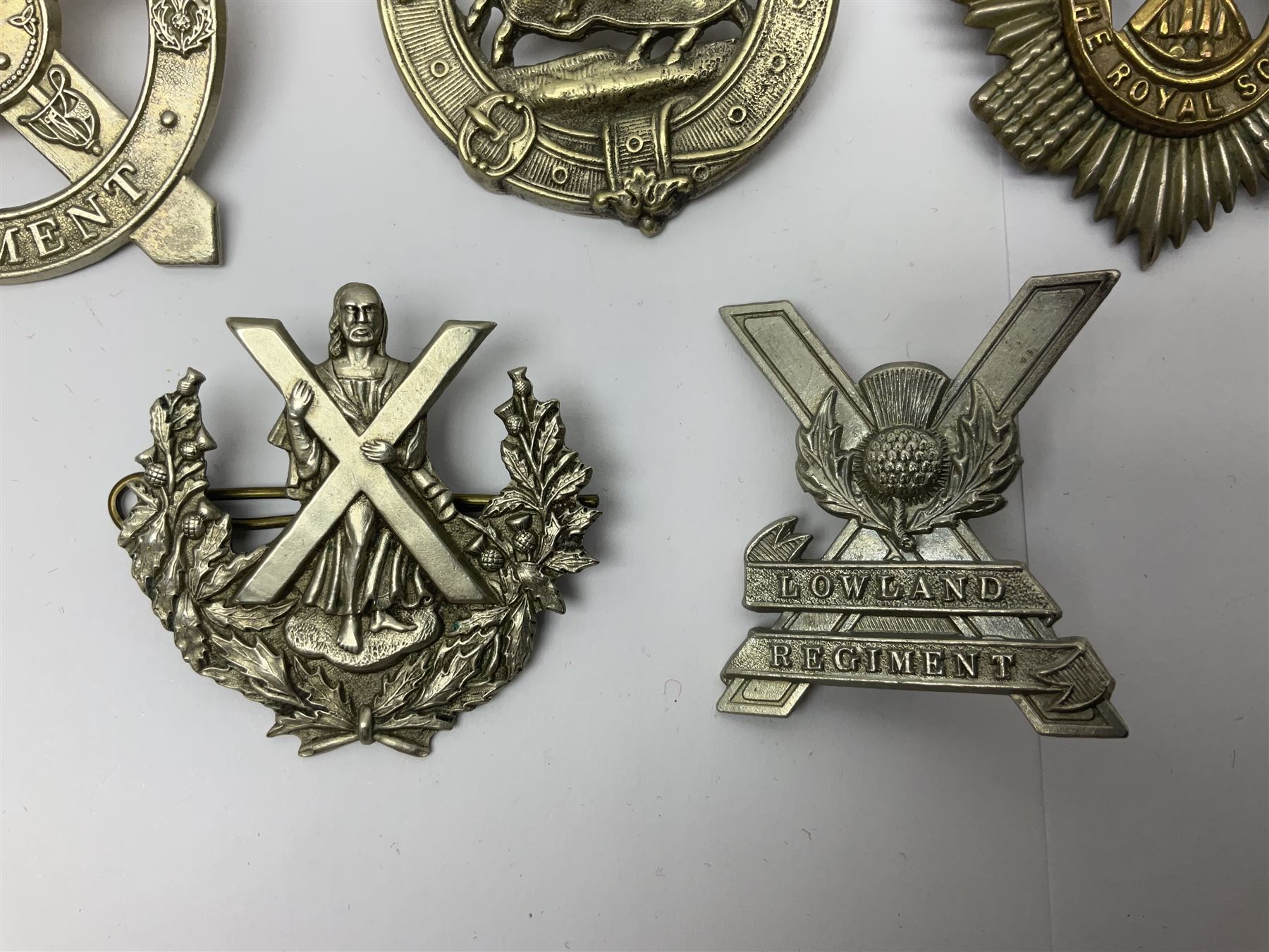 Nine Scottish glengarry badges - 6th Fifeshire Volunteer Battalion Black Watch, Lowland Regiment, Highland Regiment, Black Watch, Argyll & Sutherland Highlanders, Kings Own Scottish Borderers, Cameron Highlanders, The Royal Scots and London Scottish (9)