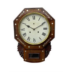 American - late 19th century 8-day mahogany drop dial wall clock, with a hexagonal dial bezel inlaid with mother of pearl, pendulum box with a rectangular viewing glass flanked by carved representations of grape vines, with a painted dial with roman numerals, minute track and steel spade hands within a spun brass bezel, eight day striking movement striking the hours on a gong.   With pendulum & key.