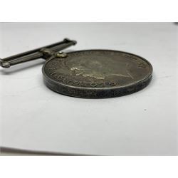 WW1 group of three medals comprising 1914-15 Star awarded to L-Cpl. W.J. Horspool R.War.R., British War Medal and Victory Medal awarded to A. Cpl. W.J. Horspool R.War.R.; WW1 British War Medal awarded to 3-8755 W.O.Cl.2. S. Paterson North'd Fus.; and hallmarked silver and enamel Northumberland Football Association Junior Cup Runners Up fob 1921-22 on silver chain (5)