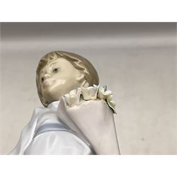 Three Lladro figures comprising, Pocket Full of Wishes no 7650, School Days no 7604 and Spring Bouquets no 7603, all with original boxes, largest example H26cm  