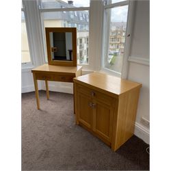 Light oak two drawer side cabinet, and a matching dressing table with mirror- LOT SUBJECT TO VAT ON THE HAMMER PRICE - To be collected by appointment from The Ambassador Hotel, 36-38 Esplanade, Scarborough YO11 2AY. ALL GOODS MUST BE REMOVED BY WEDNESDAY 15TH JUNE.