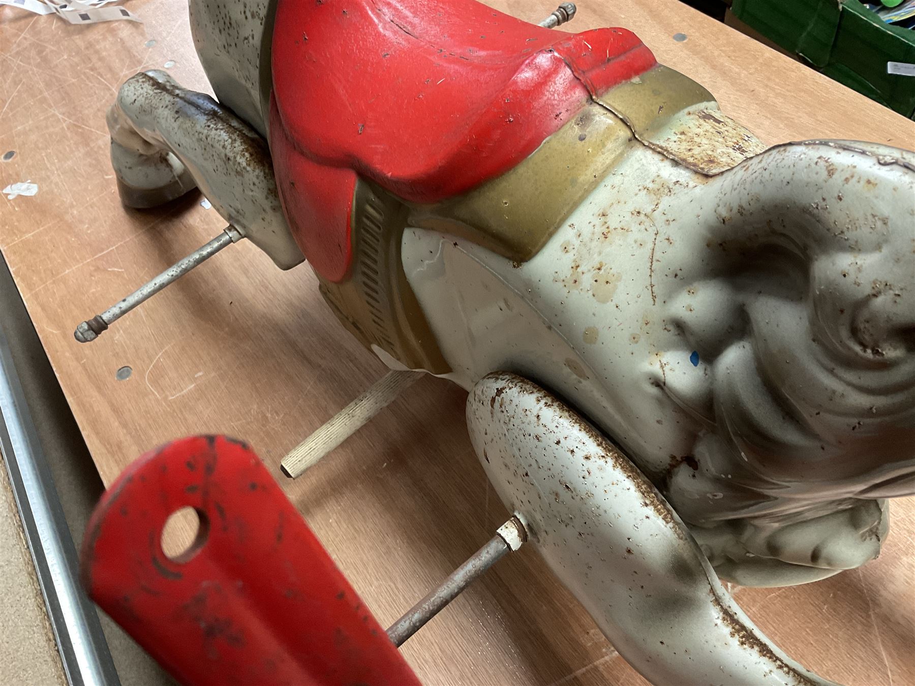 1960's Mobo Toys (David Sebel & Co) Prairie King spring rocking horse on stand, painted pressed steel construction, red tubular stand, trademark red and yellow circular Mobo logo, 100cm long (dismantled)