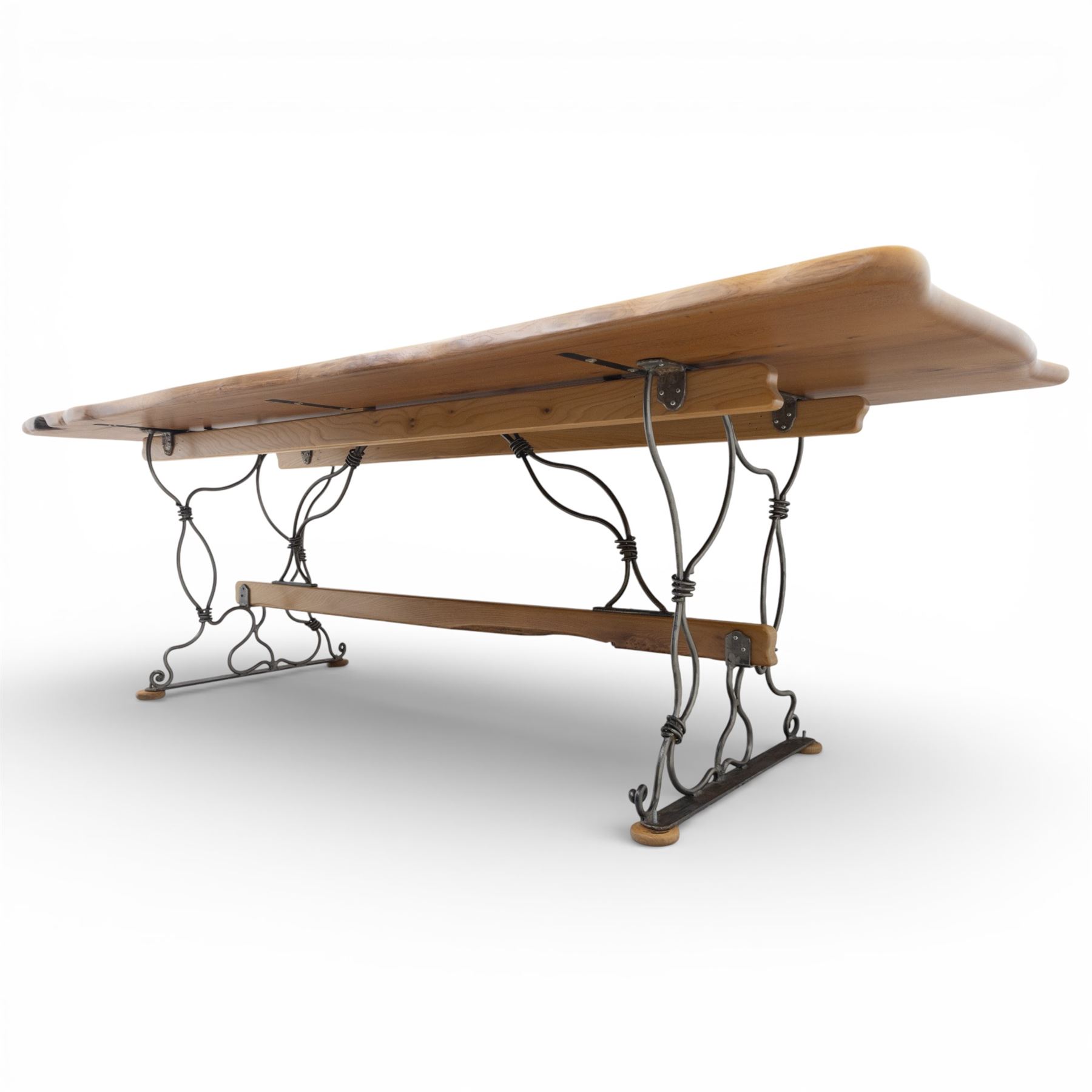 Paul Hodgkiss Designs of Glasgow - contemporary shaped elm dining table with wrought iron base; with set ten (8+2) matching high-back dining chairs, table of organic form above an elaborate wrought iron supports, with central elm stretcher, the chairs with en suite with matching wrought iron work burred elm headrest, purple velour upholstery with drop in seat     

Table: W 102cm, L 243cm, H 74cm
Chairs: W 56cm, D 52cm, H 130cm