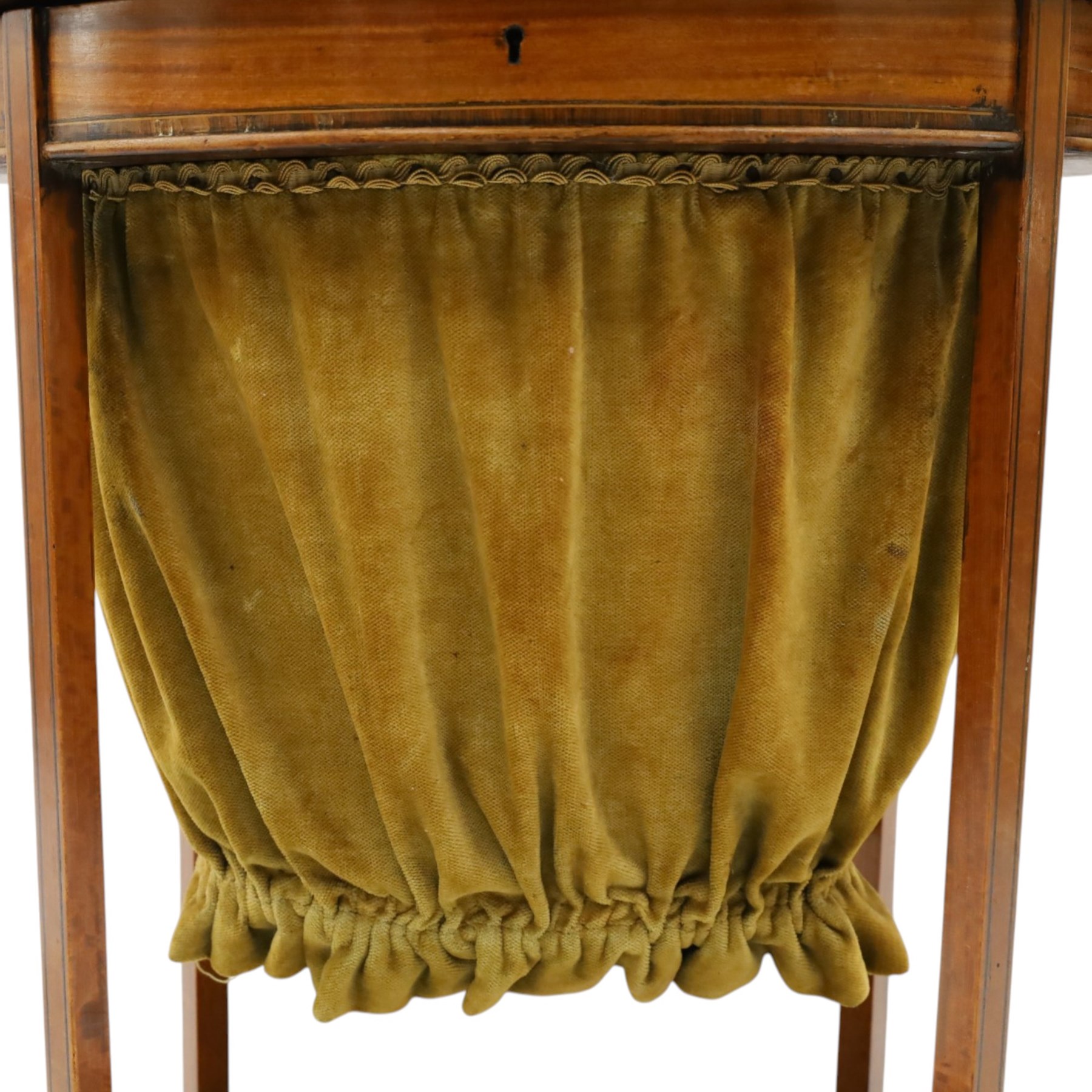 Edwardian inlaid satinwood oval sewing or work table, crossbanded and ebony-strung hinged top enclosing fitted compartment and olive-green upholstered well, raised on square tapering splayed supports united by under-tier 
