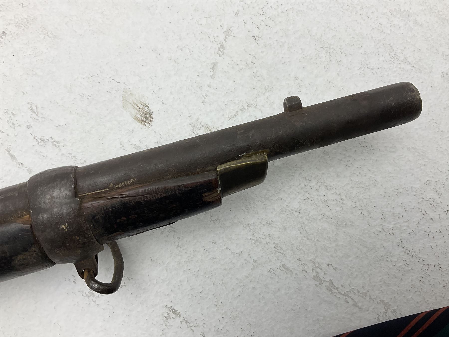 20th century Indian percussion musket, the 76cm barrel with two bands, indistinctly inscribed lock-plate, walnut full stock stamped 642 with brass butt and trigger guard and under barrel ramrod channel L121cm overall