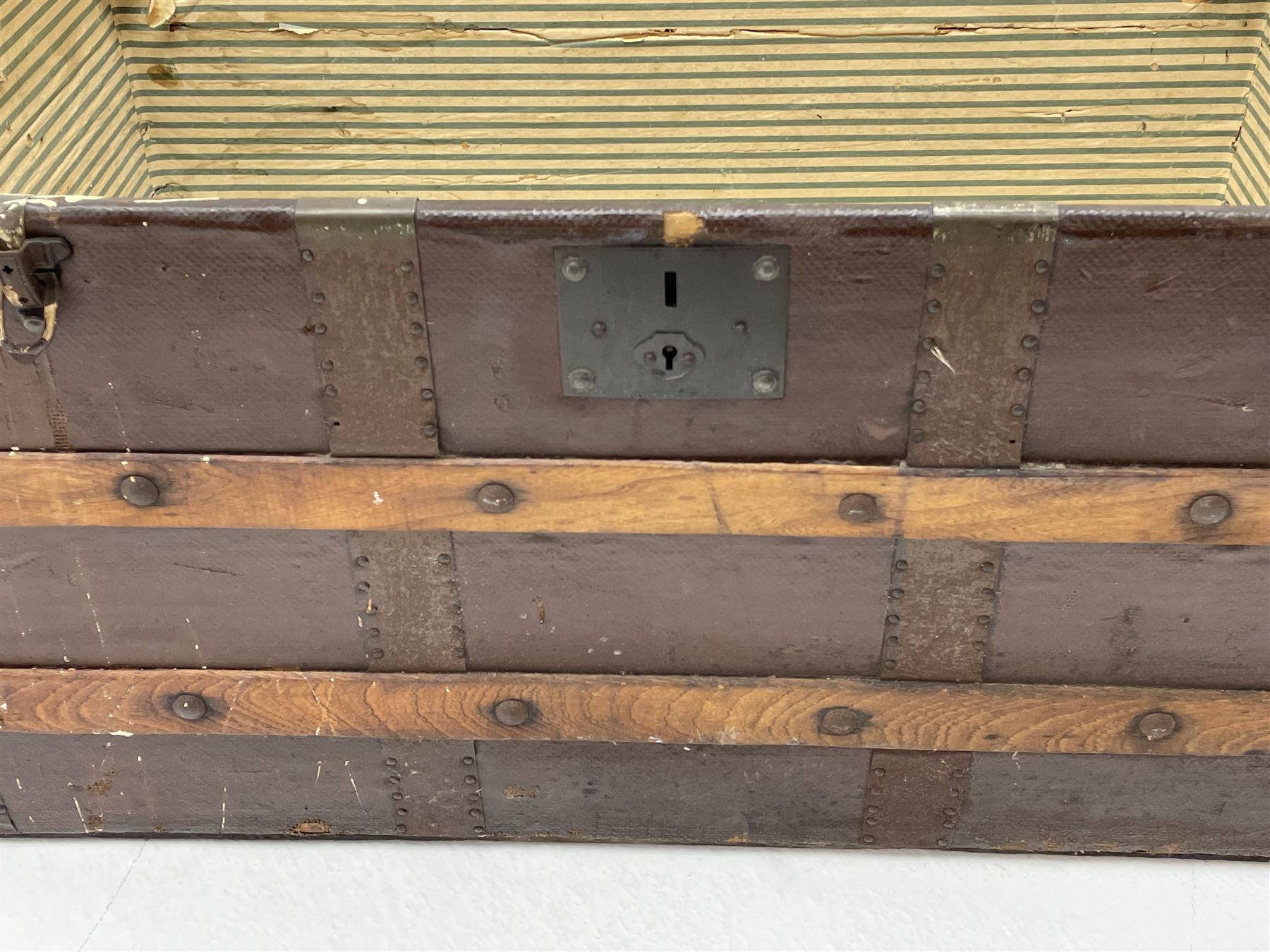 Early 20th century wood and metal bound trunk with dome hinged top