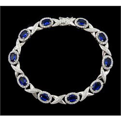 Silver cubic zirconia and blue stone set bracelet, stamped 925