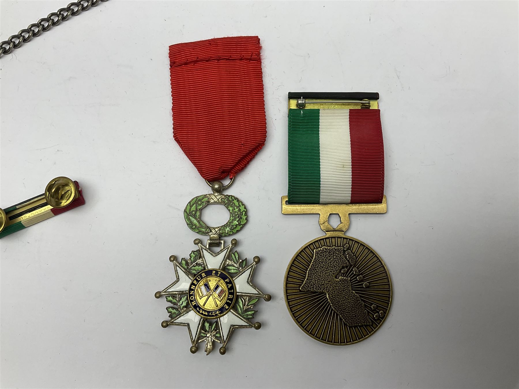 RAOB jewel Bourn Lodge 9394 with 25 years bar; two masonic jewels and triangular pendant watch; British Iron Cross style propaganda medallion; French Legion of Honour and Combatants Cross; and three foreign medals